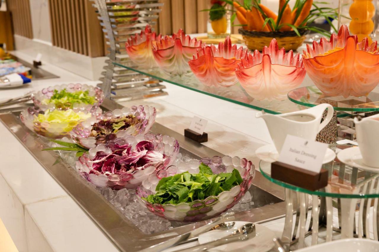 Virgo Hotel Nha Trang Exterior photo A salad bar