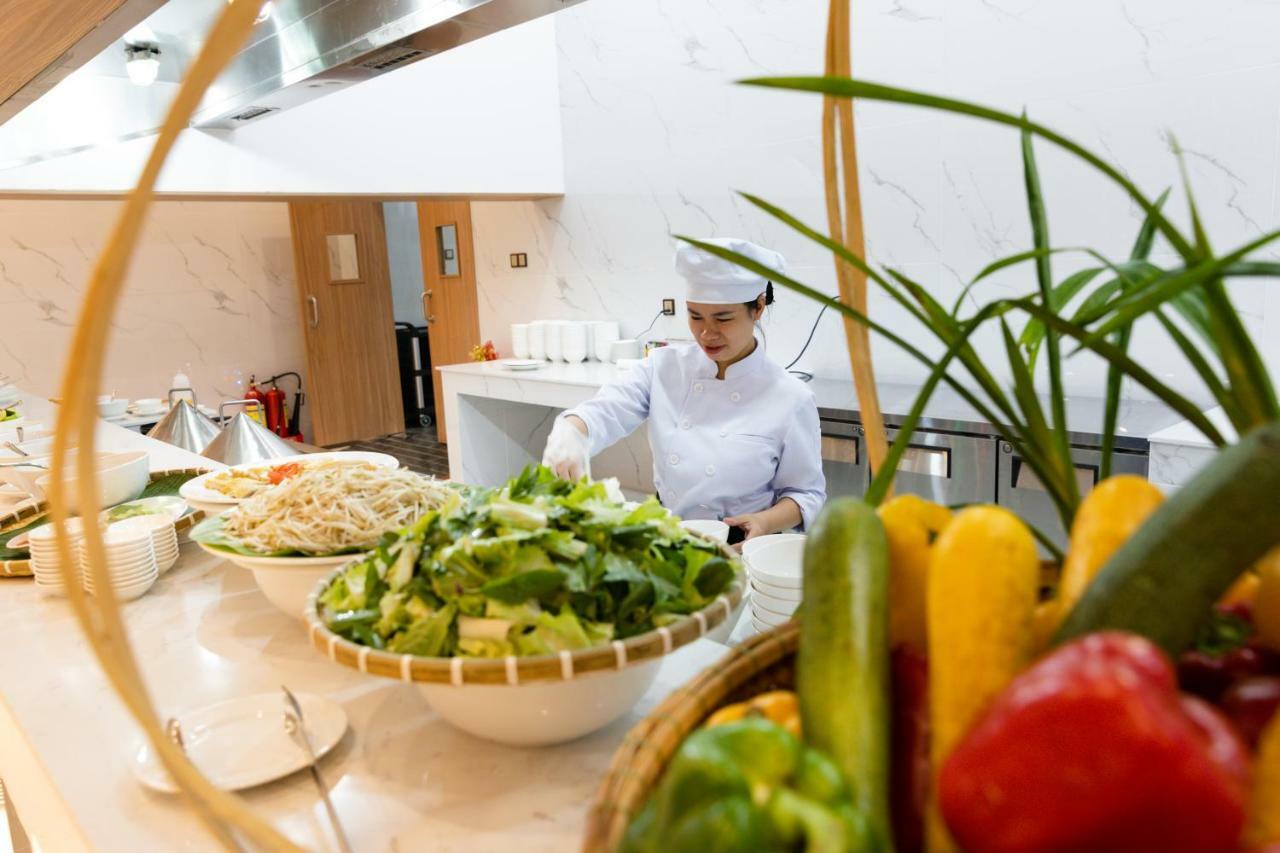 Virgo Hotel Nha Trang Exterior photo A chef working in a hotel kitchen